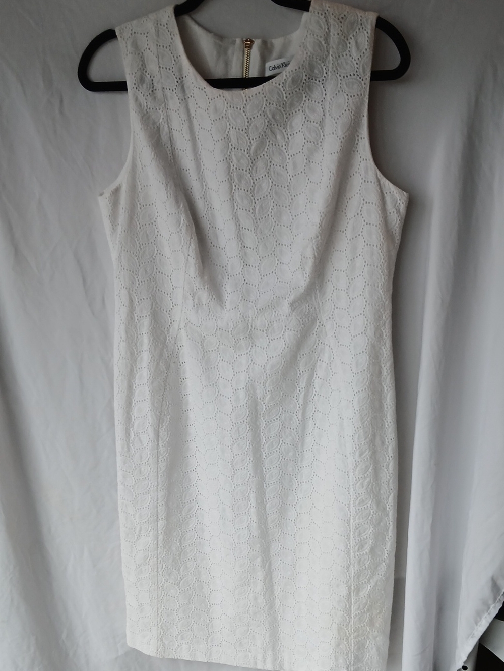 26. Calvin Klein White Eyelet Sheath Dress with Gold Zip